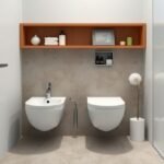 Modern bidé és toalett fürdőszobai elrendezés